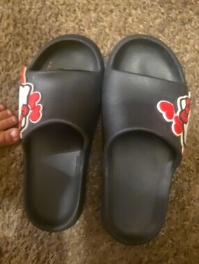 Hello Kitty Black Slide Sandals with Red and White Bow Accents